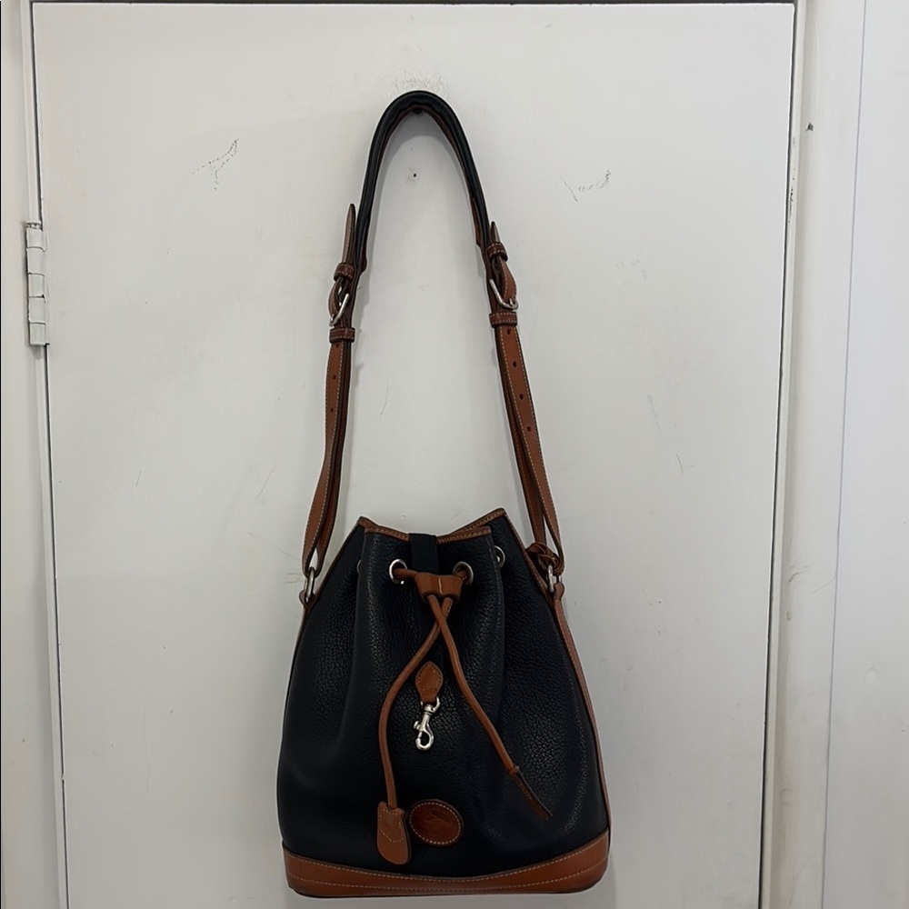 Dooney & Bourke Vintage Classic Black and Tan Leather Bucket Bag